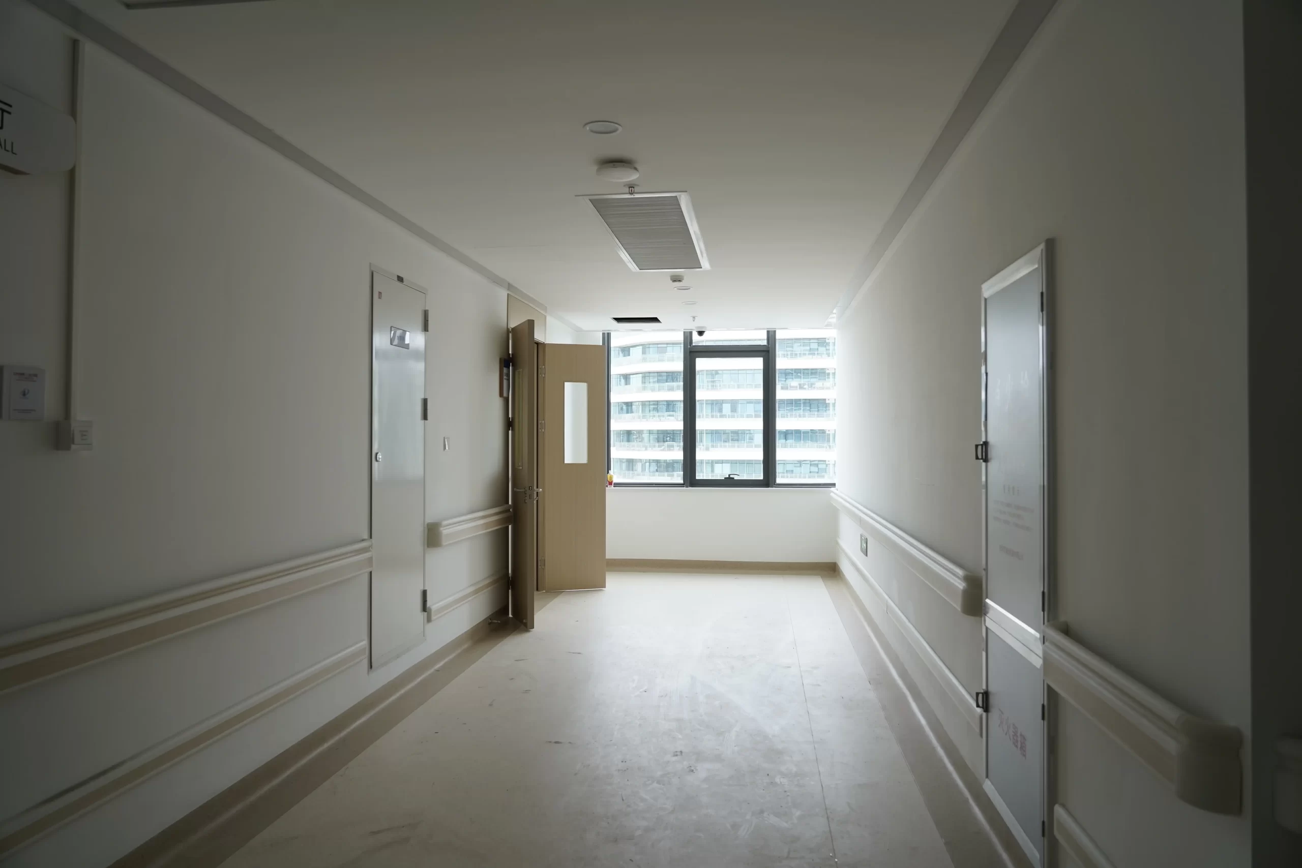 Interior view of a cleanroom corridor illustrating key design components (doors, ventilation, spatial layout) relevant to cleanroom design best practices.
