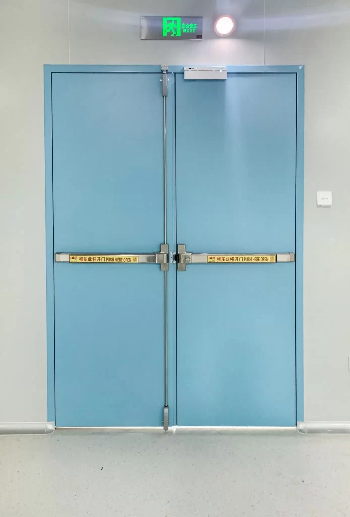 BSL laboratory blue double swing door with panic exit push bars and drop seal