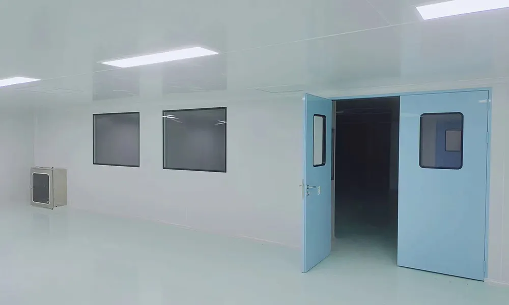 Open blue double cleanroom doors with vision glass panels in a high-class ISO cleanroom